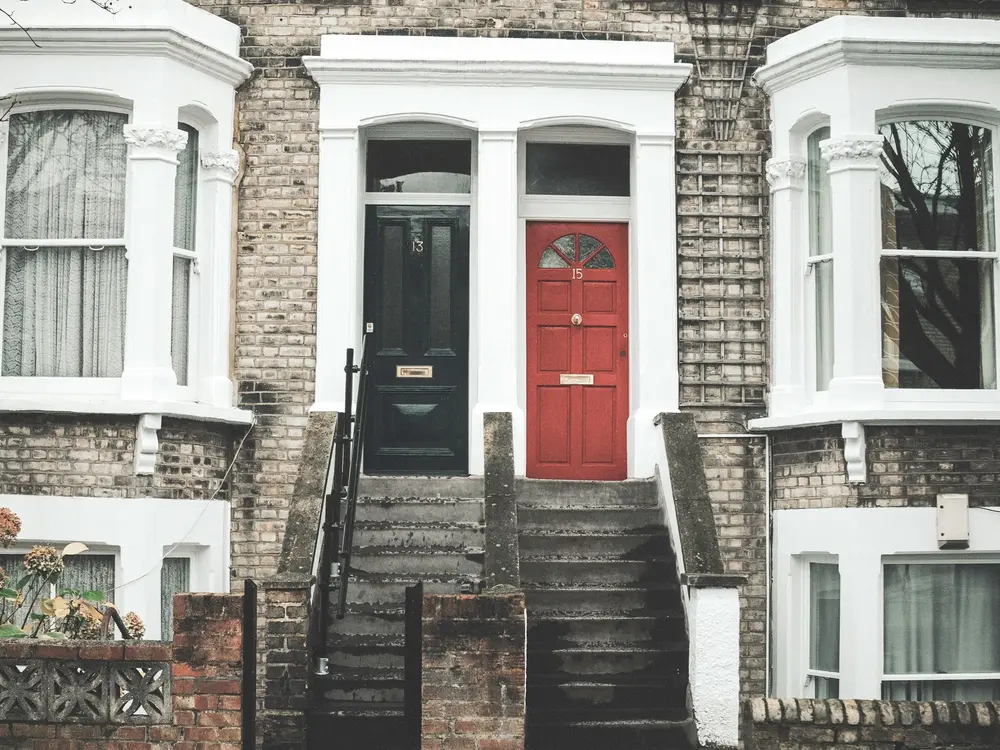 Victorian house with a red front door