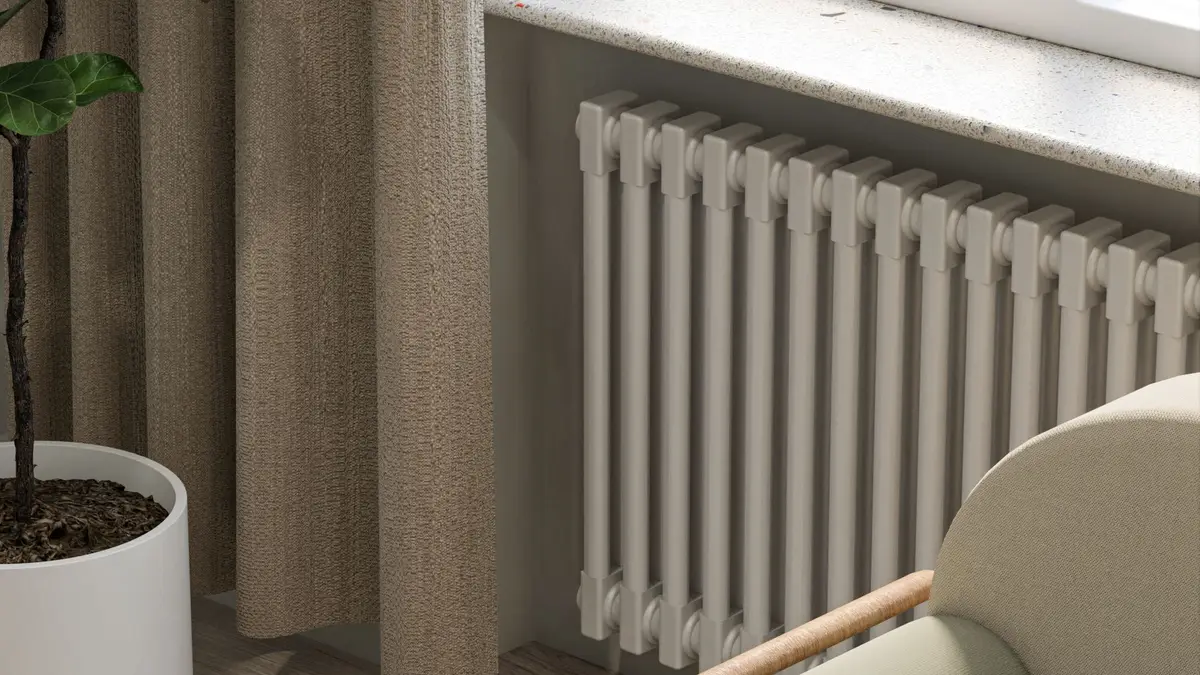 White radiator under a window in a bright living room