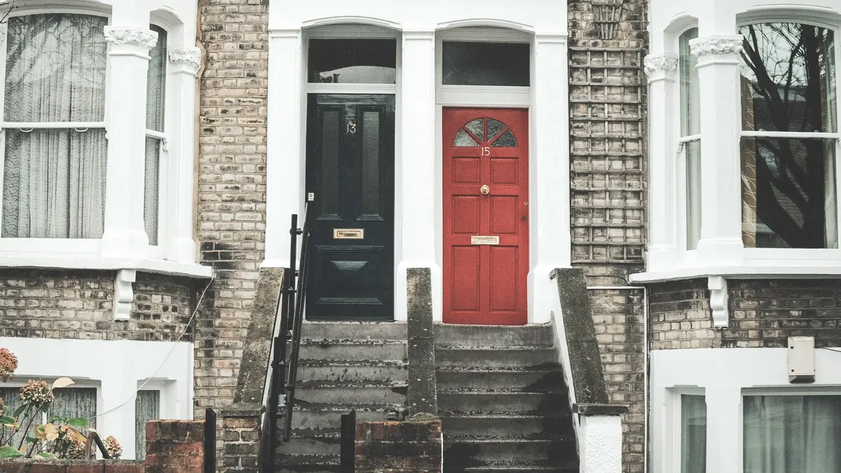 Victorian terraced house with a red front door