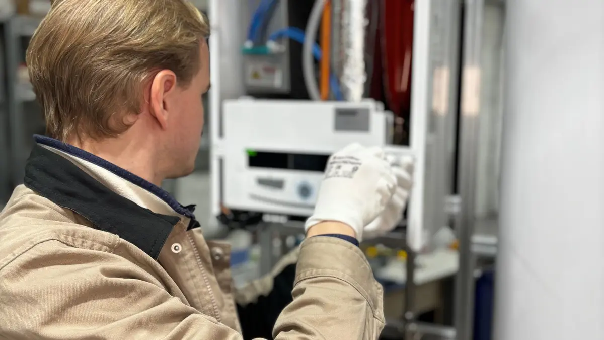 Gas engineer examining a boiler