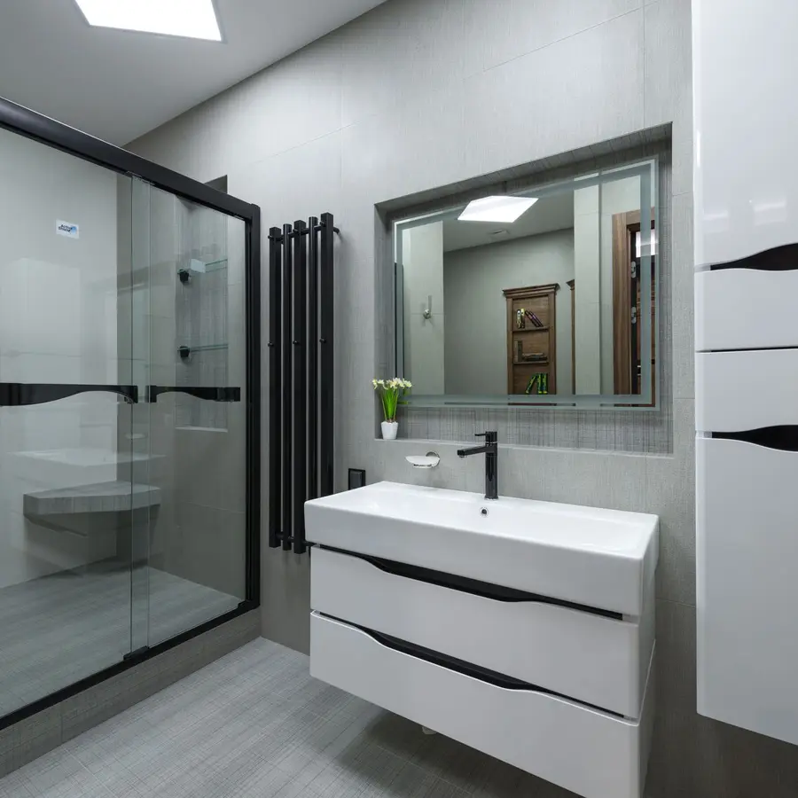 Modern bathroom with a shower enclosure and vanity unit